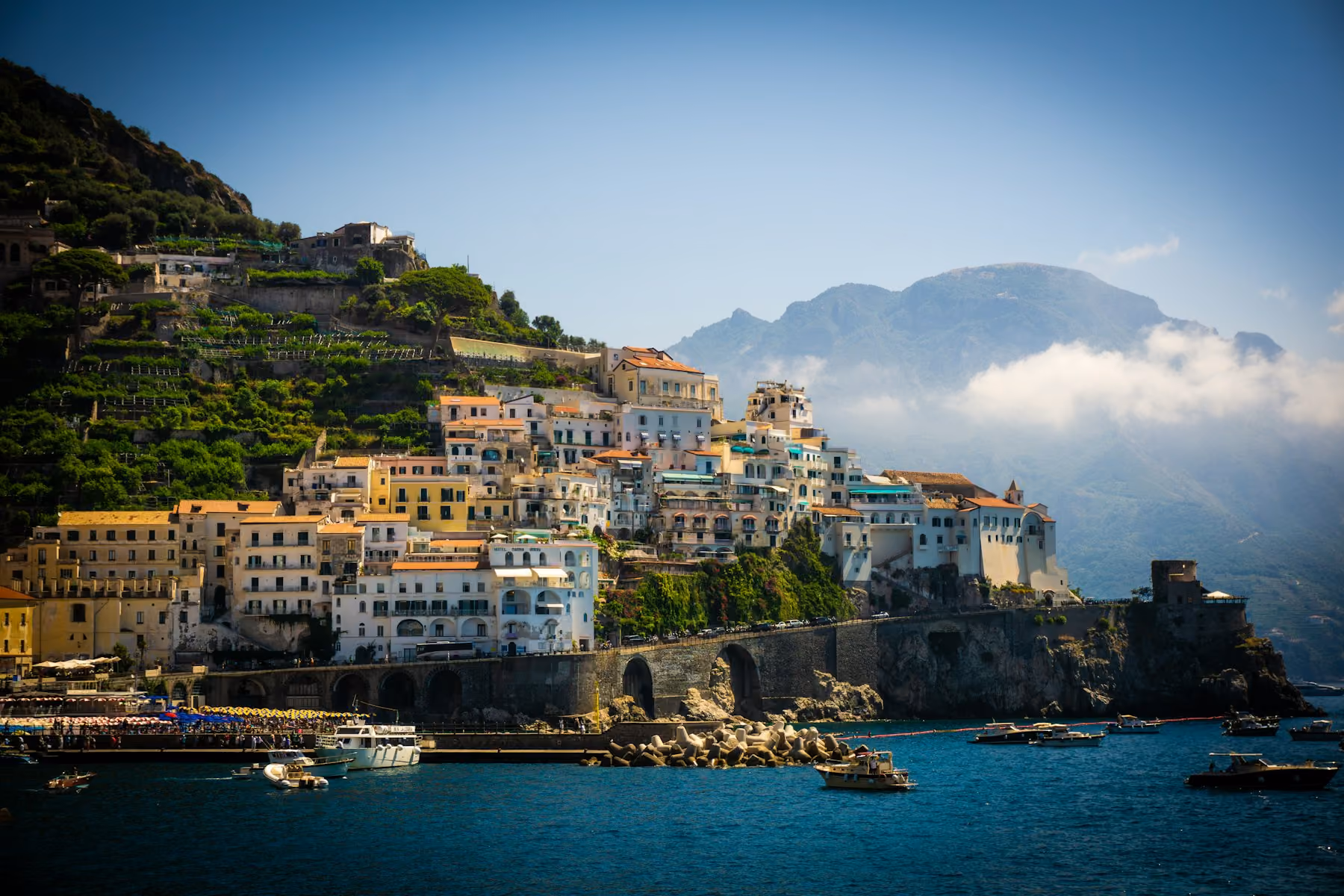 A cliffside village on the Amalfi Coast under clouds