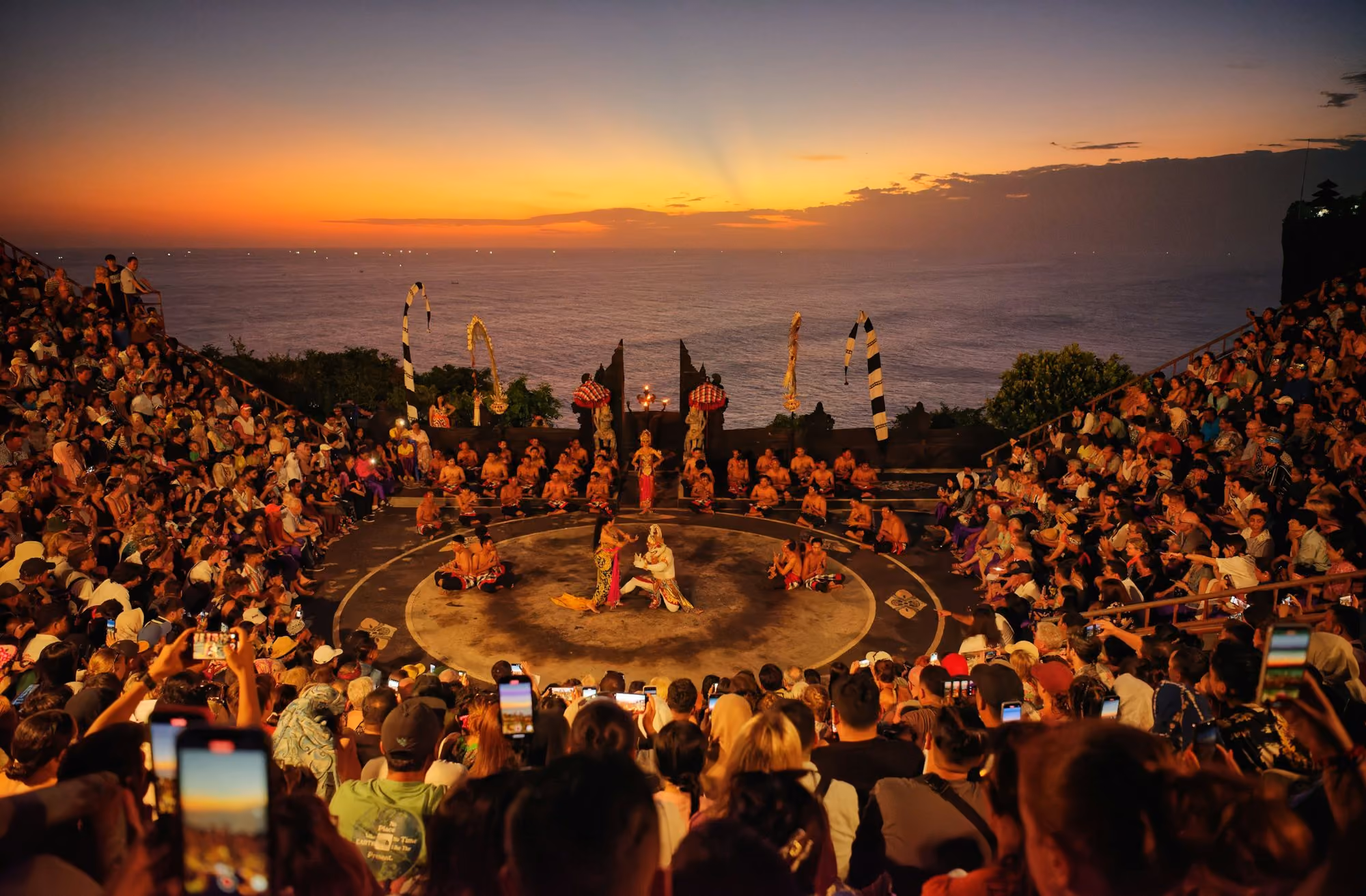 Near Alila Villas Uluwatu: A crowd of people watching a show on a stage