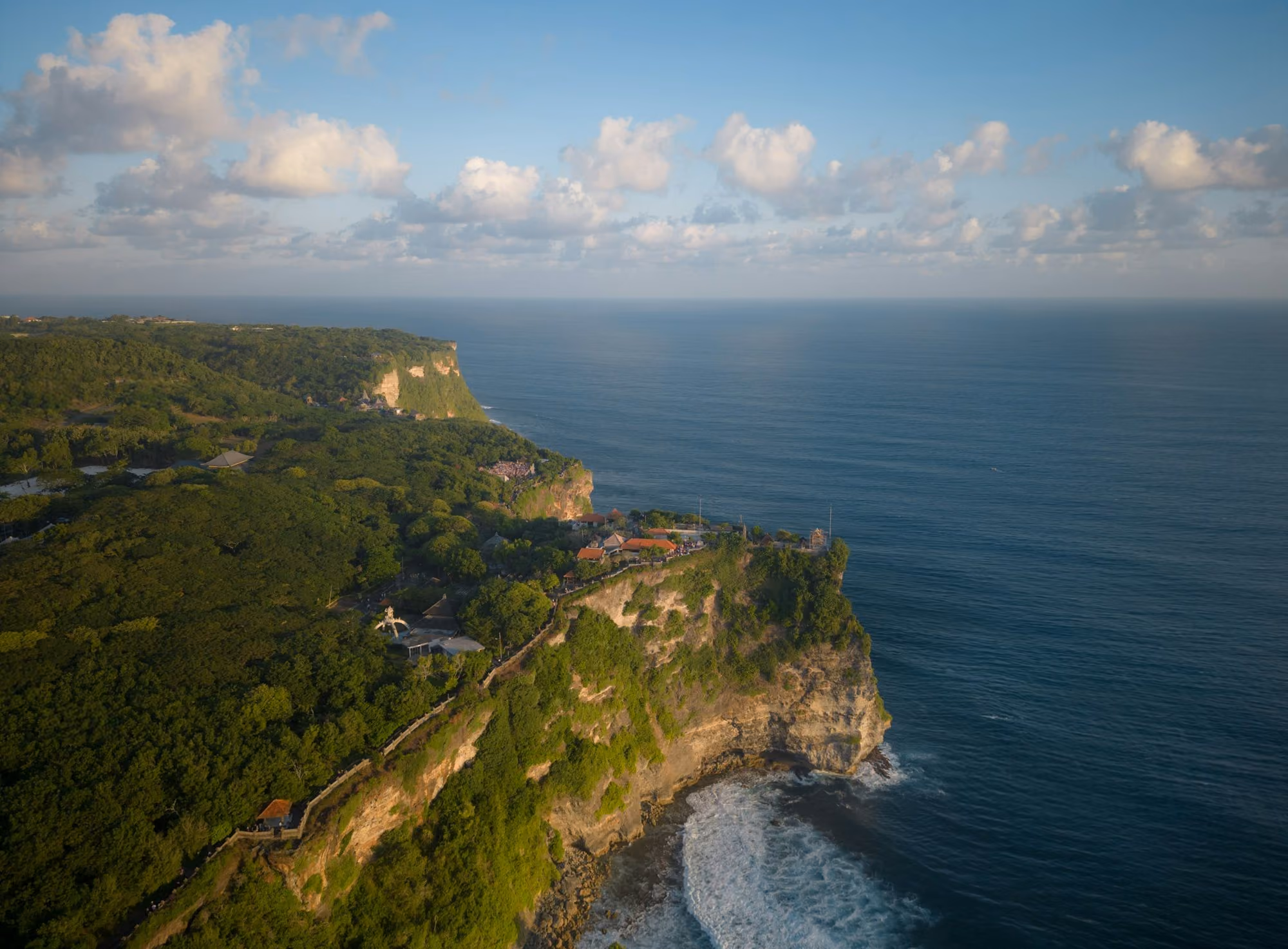 Near Amankila: an aerial view of a cliff overlooking the ocean