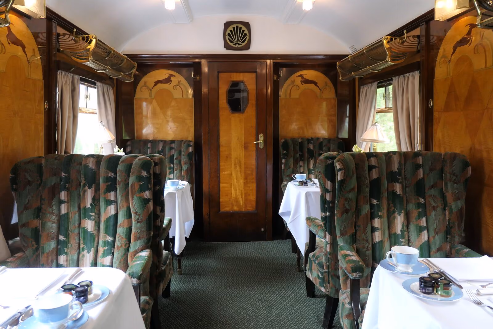 Armchairs and marquetry inside the British Pullman carriage Vera