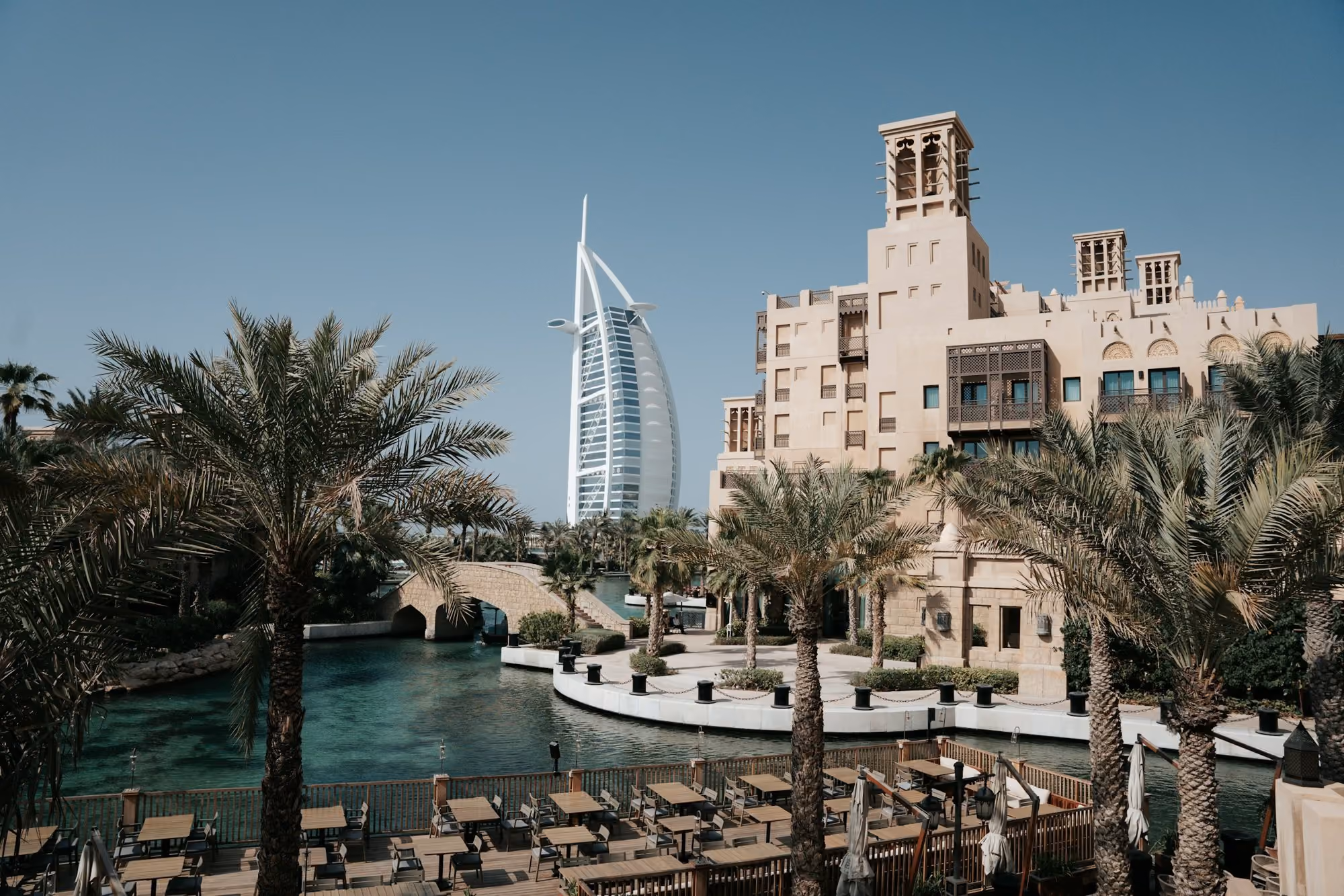 Near Jumeirah Al Qasr: a view of a city with a river running through it