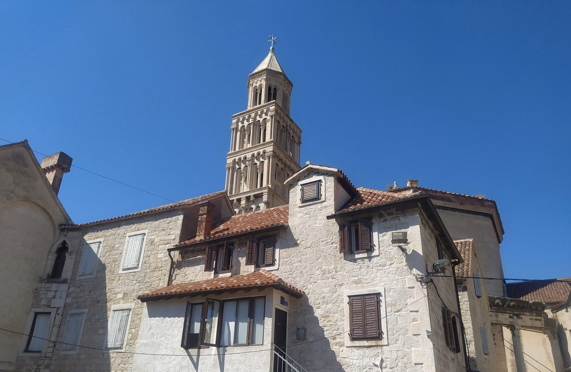 Near Palazzo President: a building with a tower
