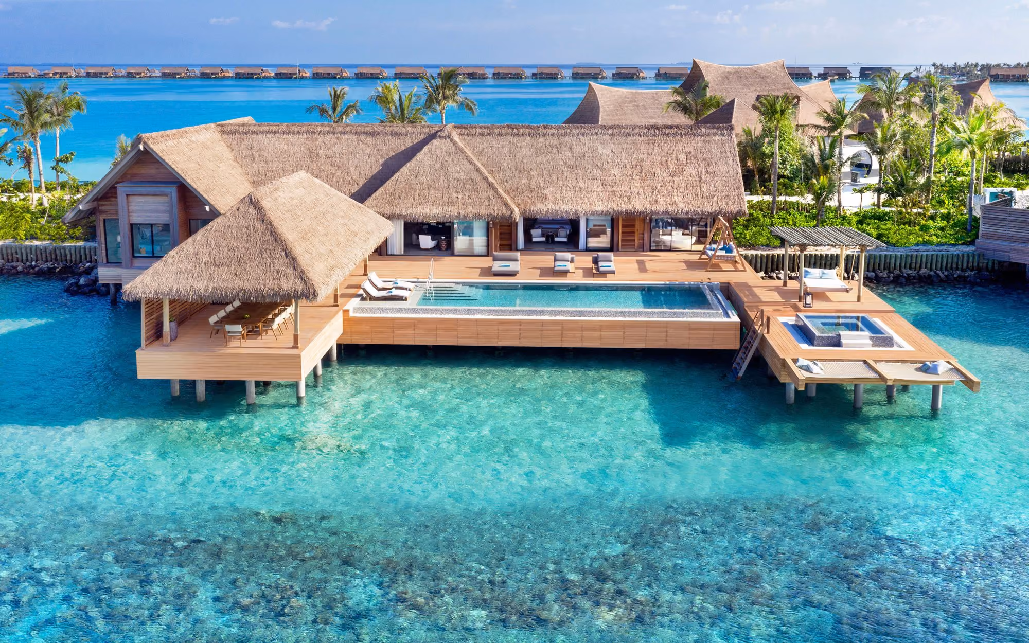 Waldorf Astoria Maldives Ithaafushi, an overwater villa with its pool