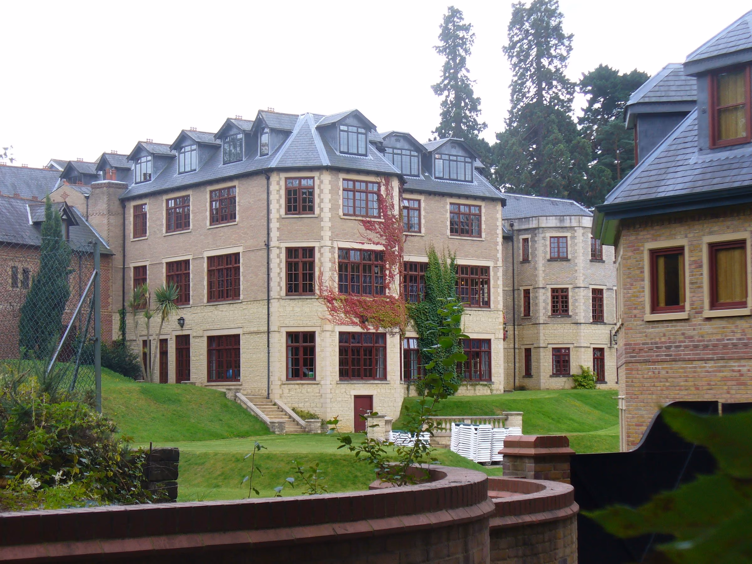 Pennyhill Park hotel buildings among the trees