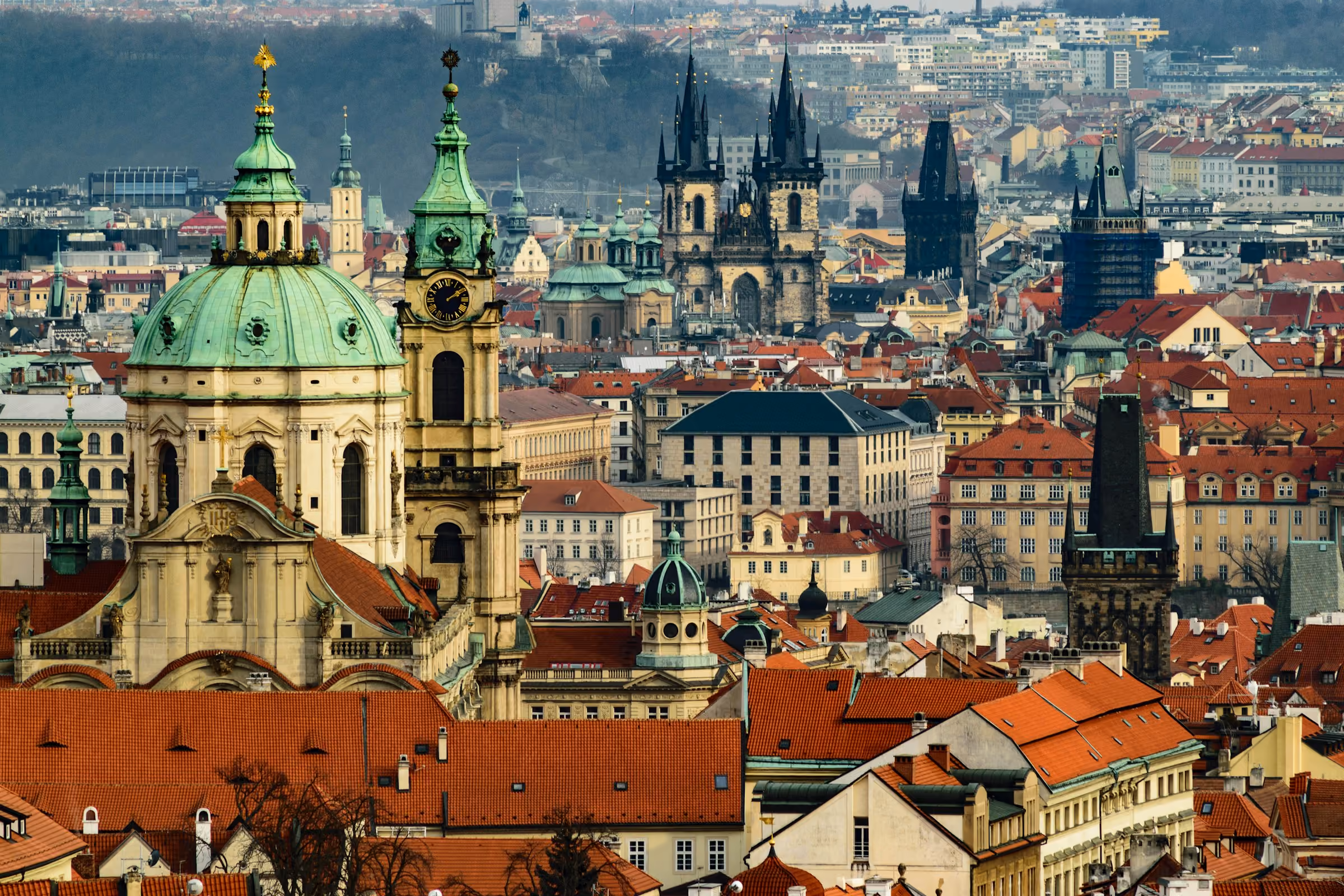 Prague's red rooftops and church towers