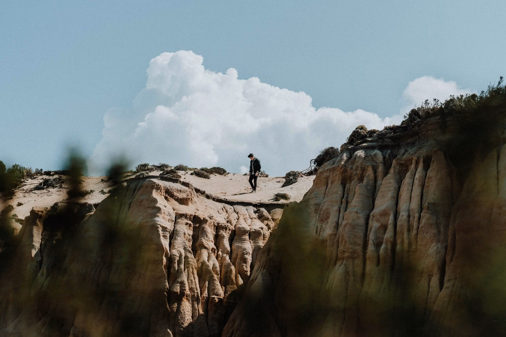 Near Vermelho Melides: man standing on cliff