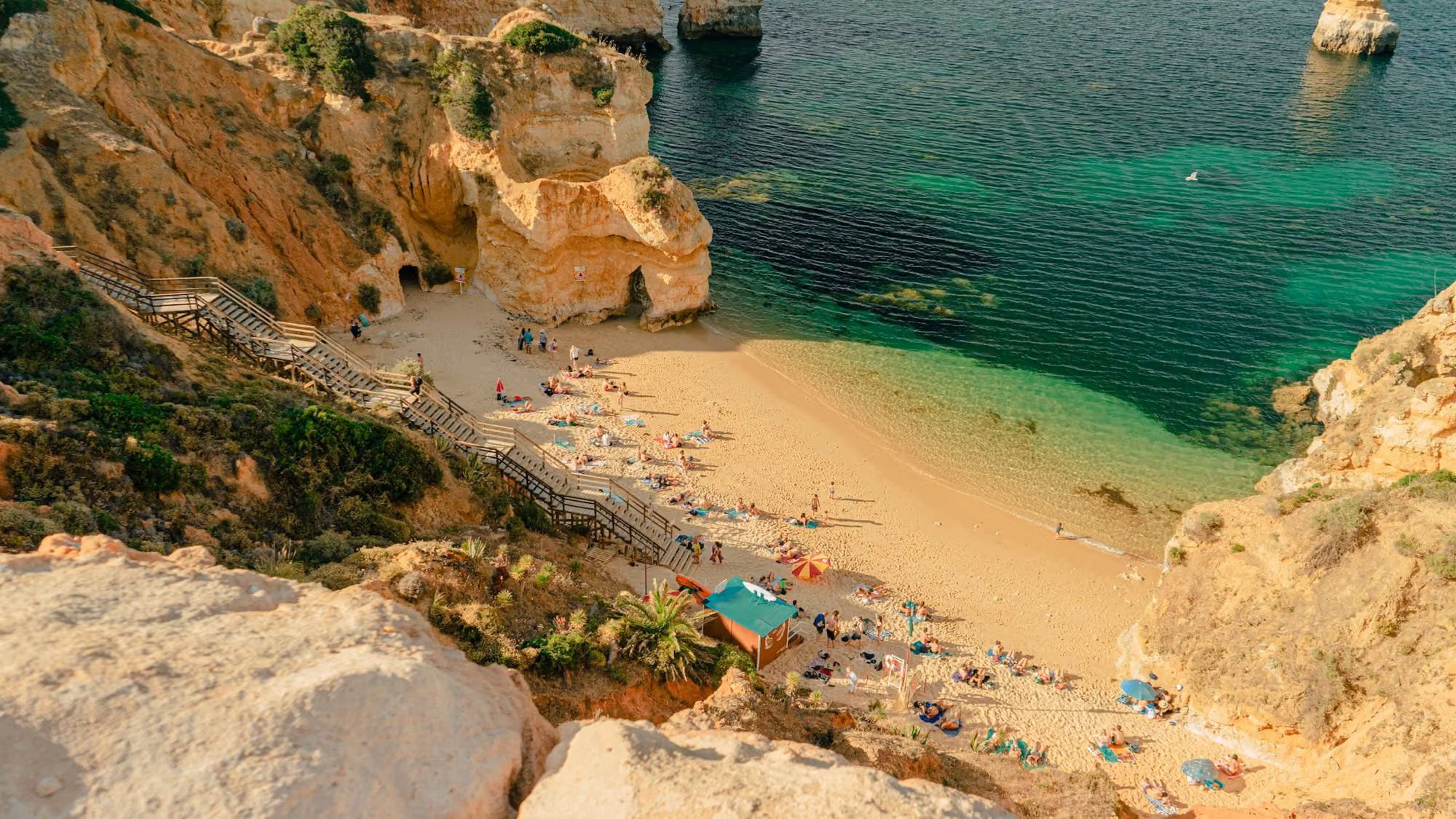Near Vila Joya: people on beach during daytime