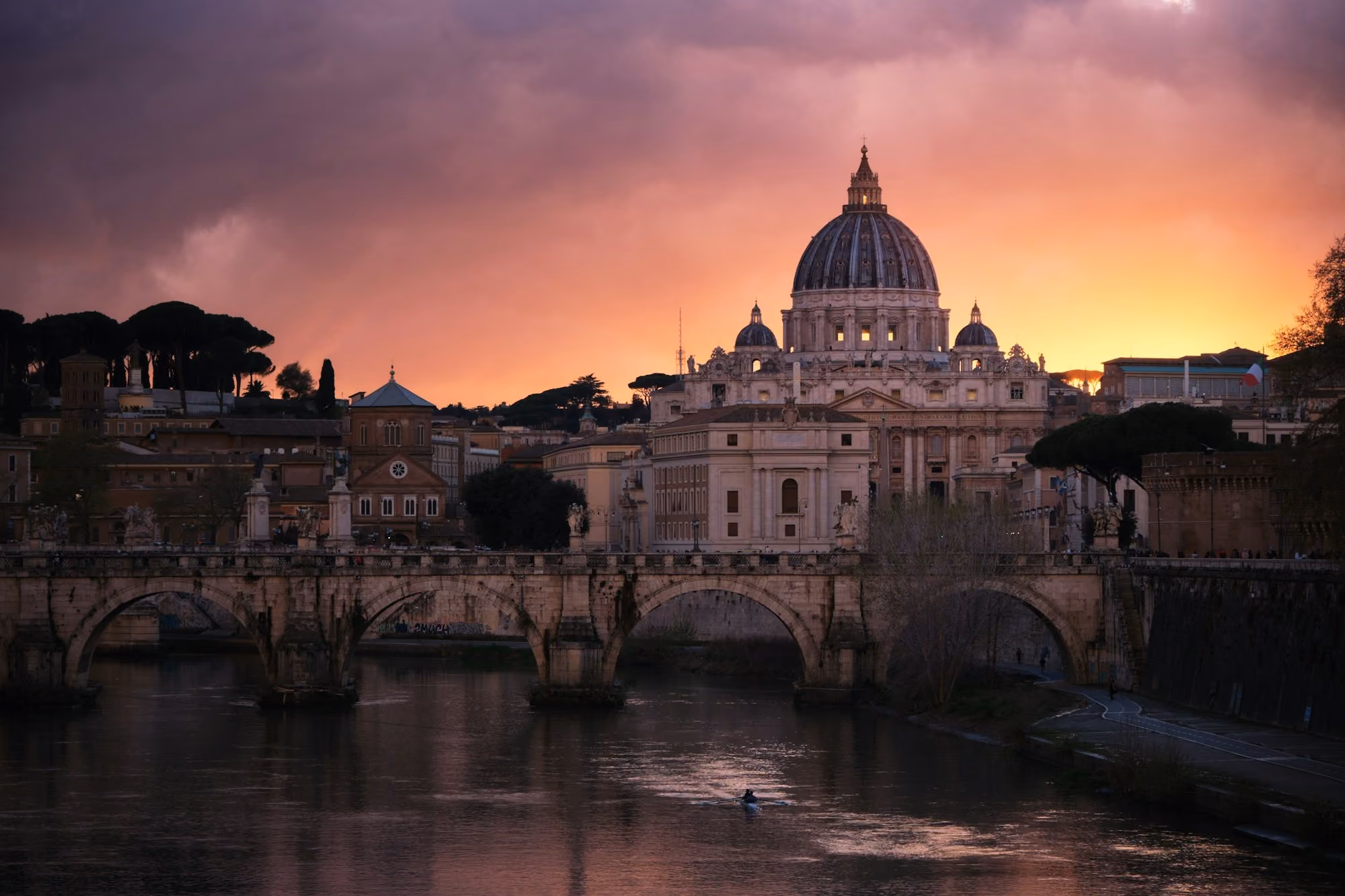 Near Villa Agrippina, Gran Meliá: a bridge over a body of water with a building in the background