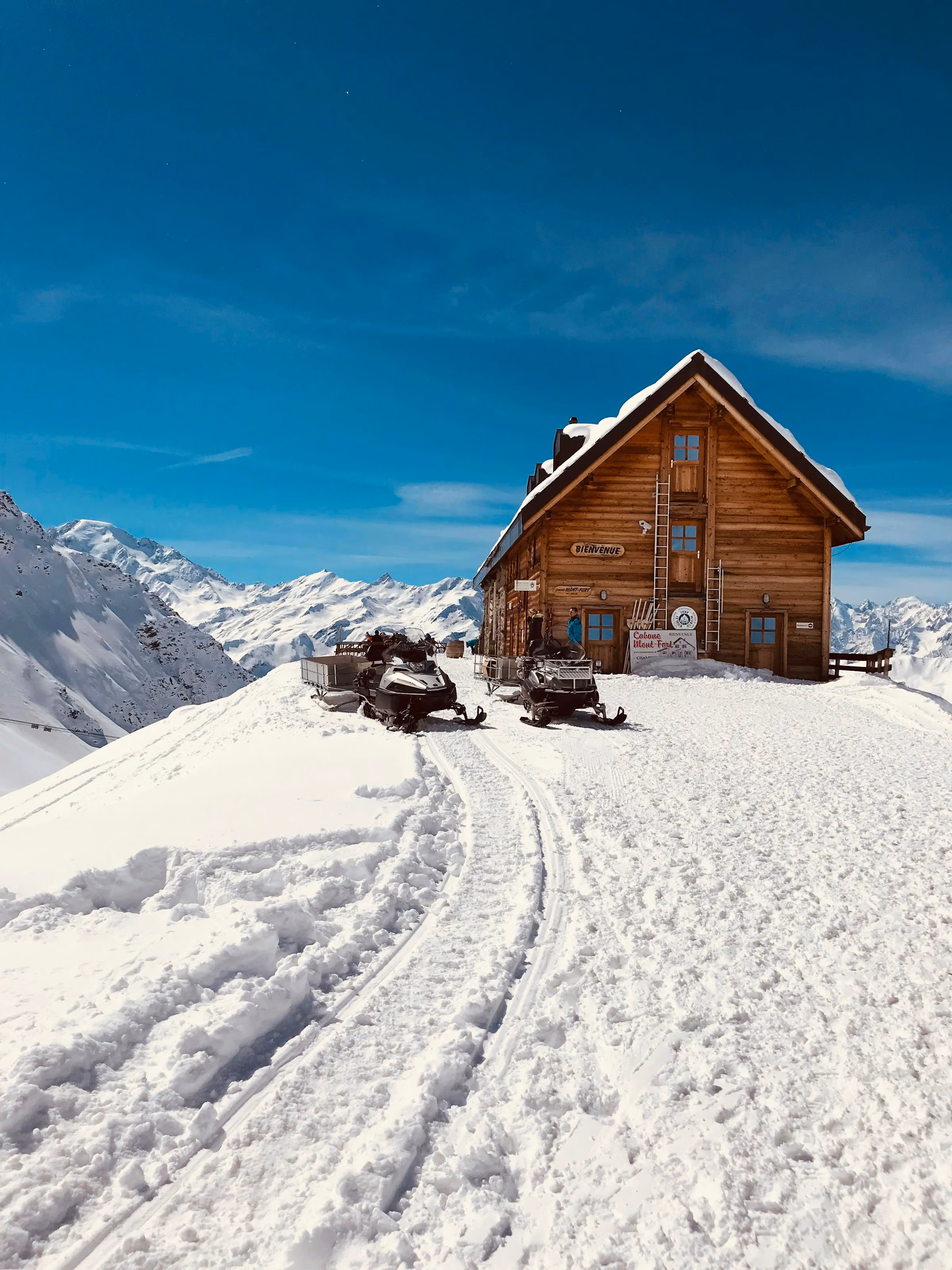 A wooden chalet in deep snow near Verbier
