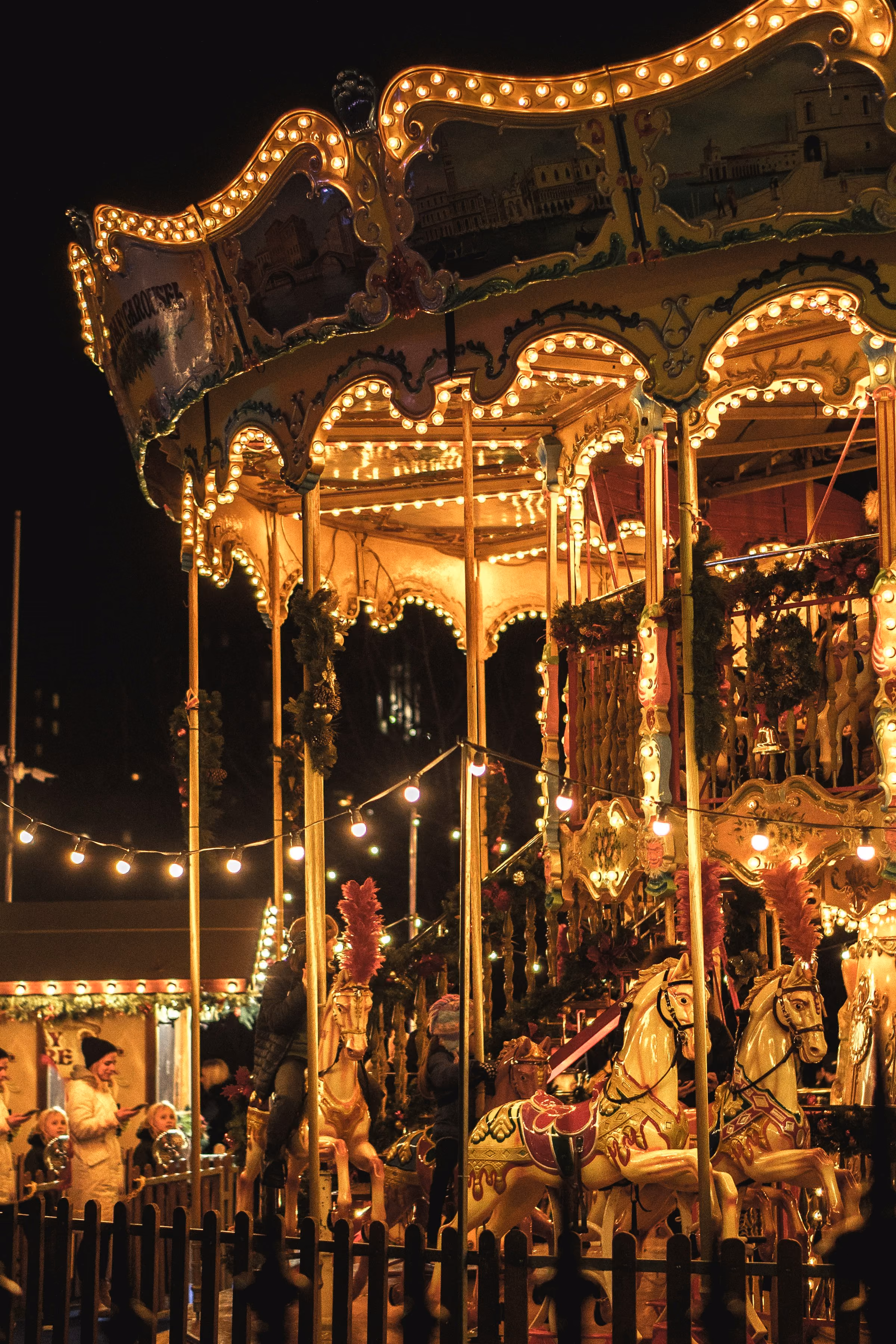 A lit carousel at Edinburgh's Christmas market