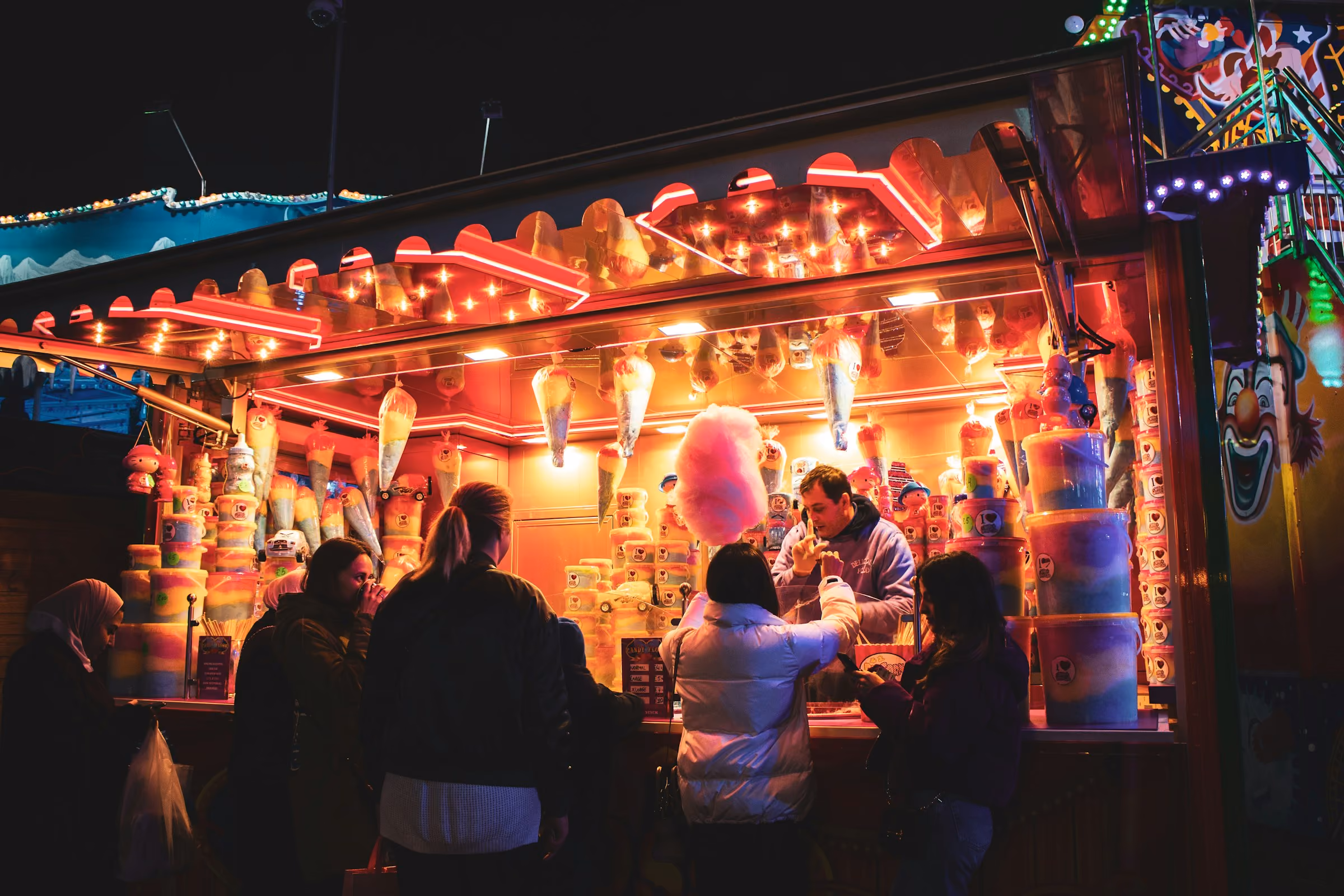 A glowing food stall at Winter Wonderland